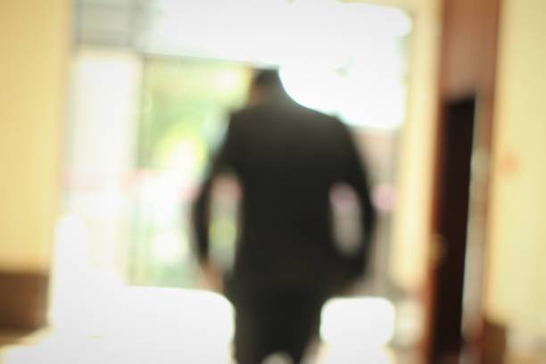 istock Defocused Man in Hotel Corridor 887417496