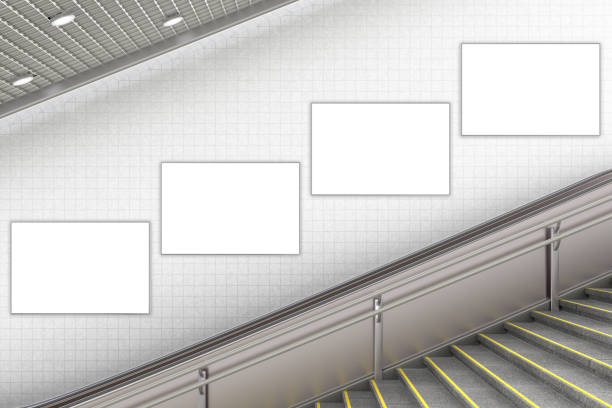 istock Blank advertising poster on underground escalator wall 887419398