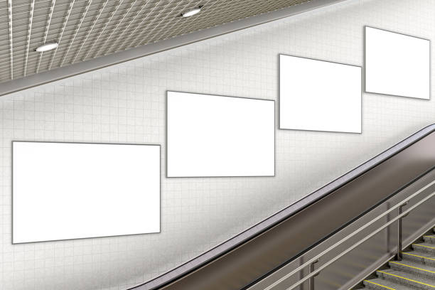 istock Blank advertising poster on underground escalator wall 887421192