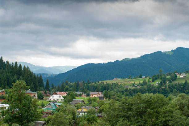 istock Carpathian mountains village with cloudy weather 887427212