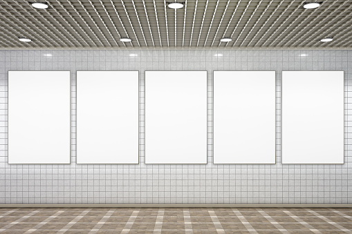 Blank vertical advertisement posters in subway underground hall. 3d illustration