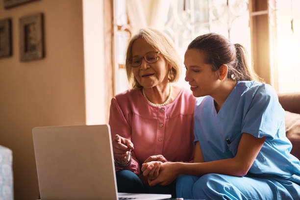 istock Showing her how easy it is to stay connected 887437226