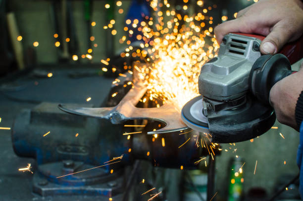 istock Industrial grinder with sparks 887437760
