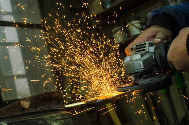 istock Industrial grinder with sparks 887438114
