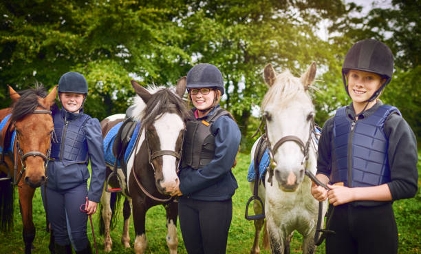 All great days are spent with a horse Shot of a group of teenage girls going horseback riding together all horse riding stock pictures, royalty-free photos & images