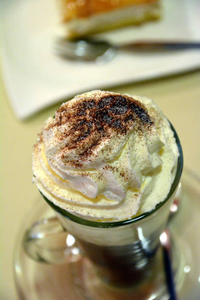 istock Viennese coffee with whipped cream on glass cup. 887442156