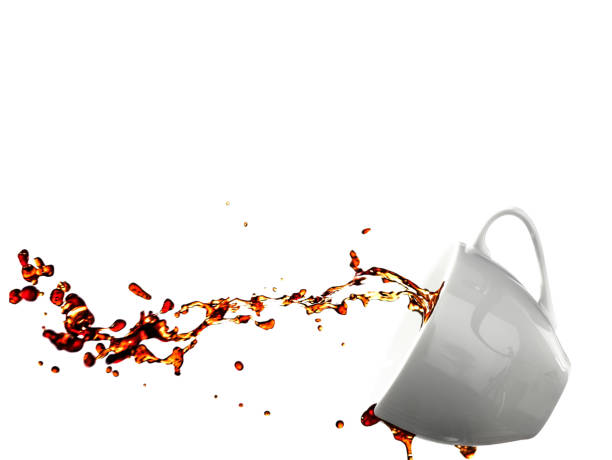 istock Coffee splashing from a cup together with coffee beans isolated on white background with clipping path 887442382