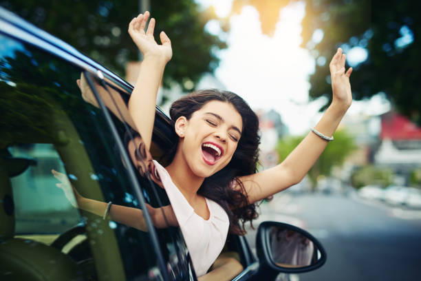 Celebrating her new car