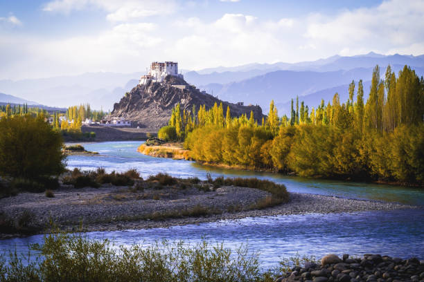 istock Stakna Gompa and Indus river before sunset with cloudy sky and mountains background 887449292