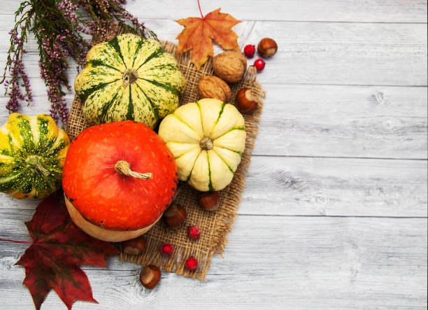istock Pumpkins with autumn leaves 887464336