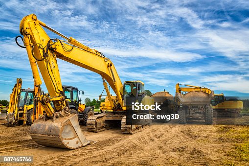 istock Road construction machinery on the construction of highway 887465766