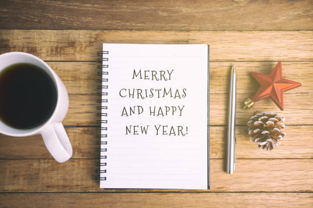 istock Merry Christmas and Happy New Year on Notepad 887471950