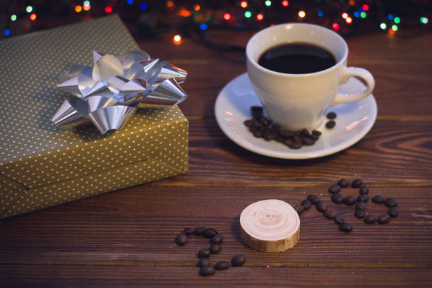 istock Still life with a coffee cup and a gift box 887478942