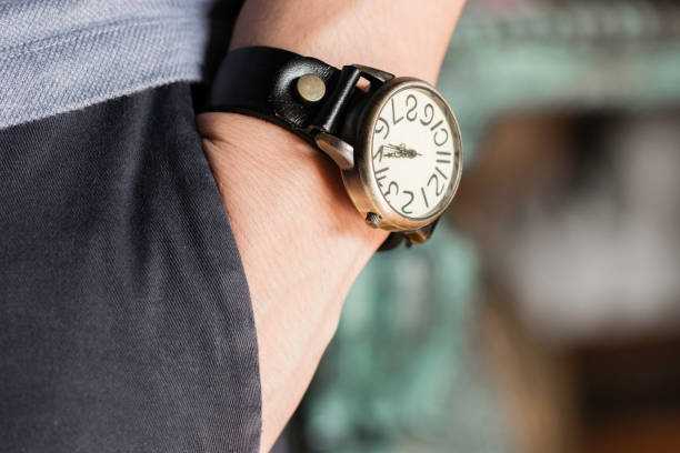istock Man wearing old watch on left wrist 887483298