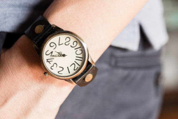 istock Man wearing old watch on left wrist 887483302