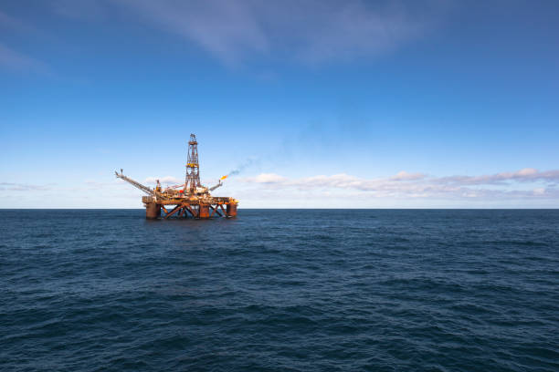 istock Oil platform at sunny day 887490952