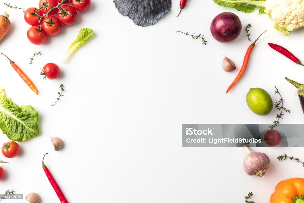 vegetables for salad Top view of different vegetables for salad isolated on white Vegetable Stock Photo