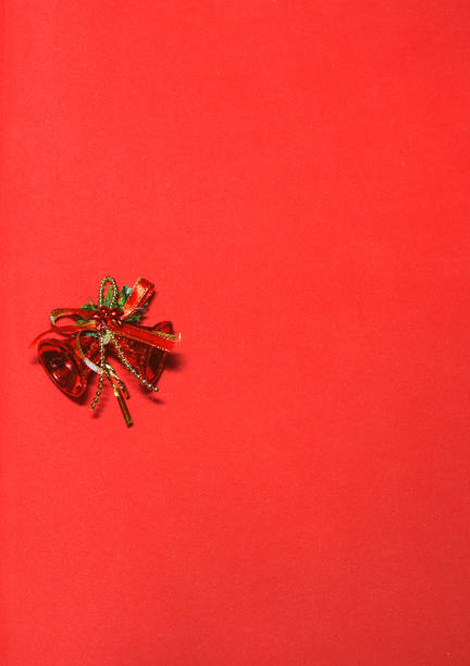 istock red bells on the red background. decoration with red bells. 887491674