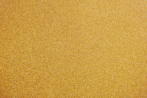 istock Golden glitter background with little sparkles 887500296