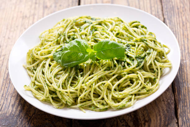 istock plate of pasta with pesto sauce 887500704
