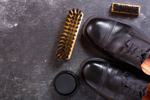 istock black men's shoes with care accessories 887500980
