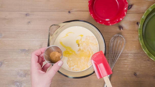 istock Mixing ingredients for pumpkin pie filling 887501676