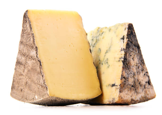 istock Two pieces of cheese isolated in white background 887508404