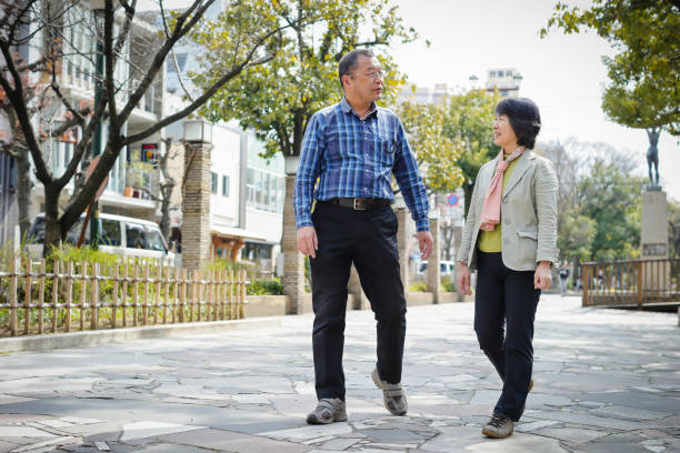 istock Senior couple walking 887509552