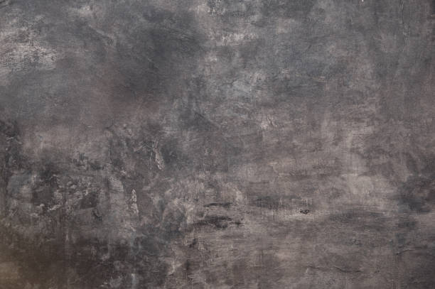istock Dark grunge background looking like a stone 887516658