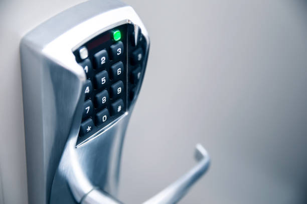Door handle with modern electronic combination lock stock photo