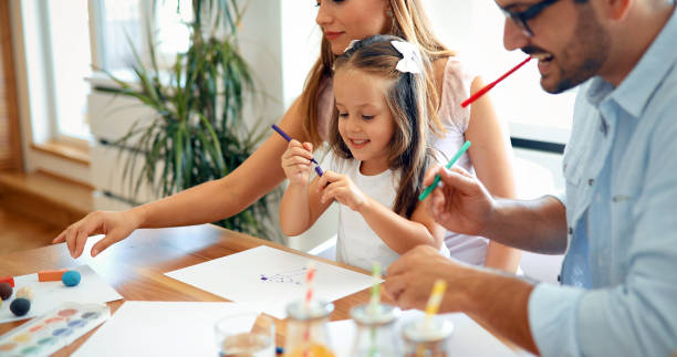 istock Happy familiy spending fun time at home 887517938