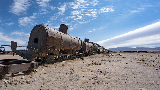 Uyuni, Bolivia - September 2017: Rusty old train at the Train Cemetery in Uyuni desert, Bolivia, South America
