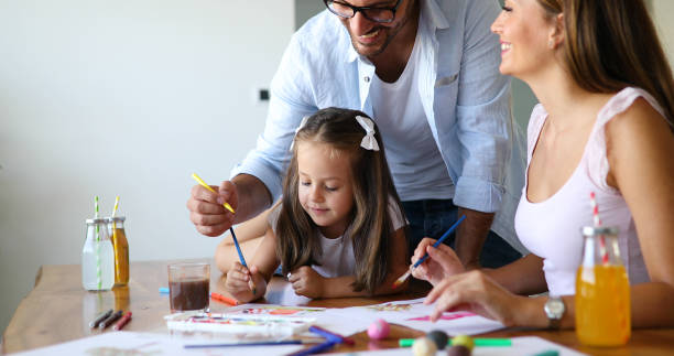 istock Happy familiy spending fun time at home 887523212