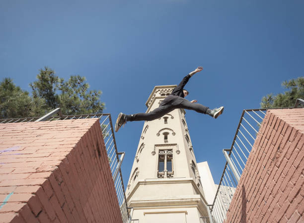 istock Man practicing parkour in Cornella de Llobregat Catalonia Spain 887533058