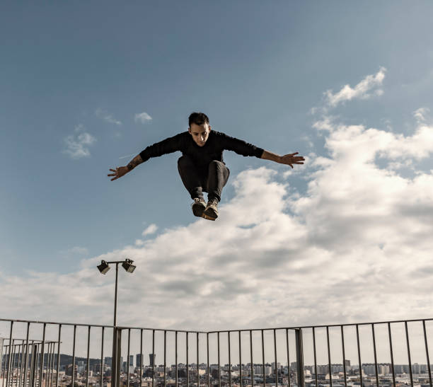 istock Man practicing parkour in Barcelona Catalonia Spain 887533134