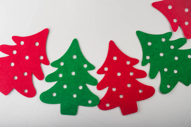 istock abstract red and green christmas trees 887536094