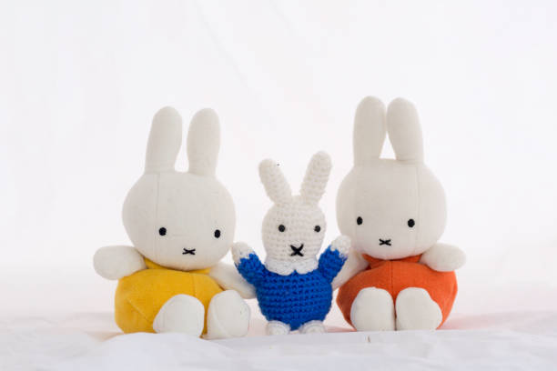 istock Doll family Rabbit on a white background 887538048