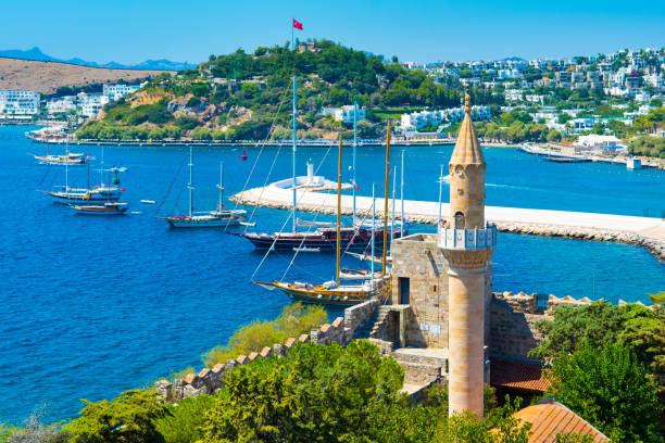 Beautiful Mediterranean landscape Bodrum, Turkey - 01 September 2017: Beautiful Mediterranean landscape of Bodrum bay, view from Bodrum castle to the old town and mosque escort in bodrum stock pictures, royalty-free photos & images