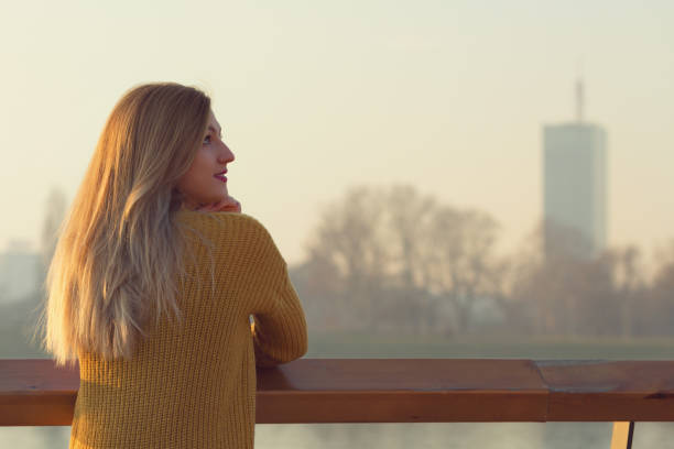 istock Beautiful woman enjoying the view. 887543256
