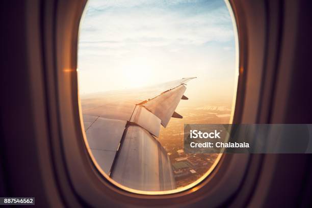 Landing At The Sunrise Stock Photo - Download Image Now - Airplane, Window, Travel