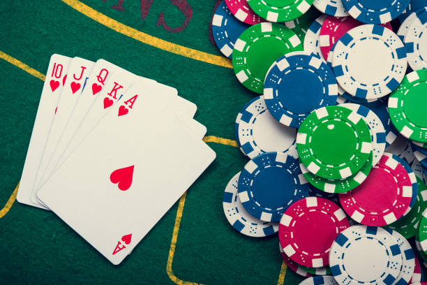 istock royal flash on cards and poker chips 887549090