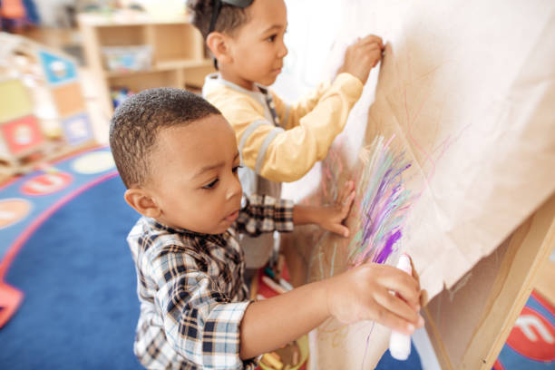 istock Kids are discovering new colours in daycare 887557838