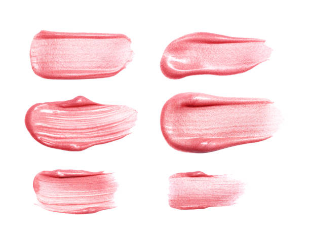 istock Set of different lip glosses smear samples isolated on white. Smudged makeup product sample 887558678