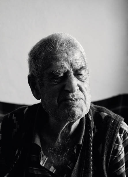 istock Old man eyes closed talking about his memories 887564198