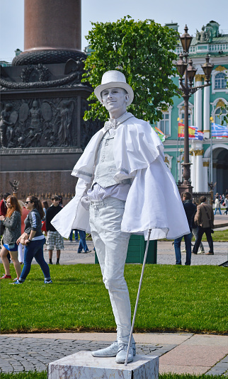 St.Petersburg,Russia-June 10, 2015: Actor-mime in the image of living statues take part in the state holiday Russia Day in St. Petersburg. The annual national holiday The Day of Russia is celebrated in the country since 1992 on a non-working day with entertainment events with the participation of various artists.