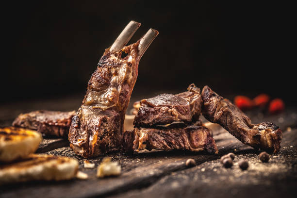 istock Grilled lamb chops on wooden table 887572246