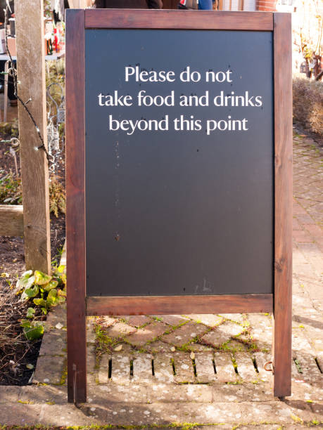 istock outside area restriction sign cafe - please do not take food and drinks beyond this point black and wood chalkboard 887577684