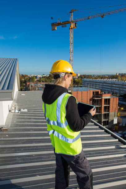 istock Femalen construction Site Inspector at the work site 887588476