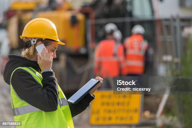 Female Ingineer Working On Constuction Site Stock Photo - Download Image Now - Construction Site, Construction Industry, Women