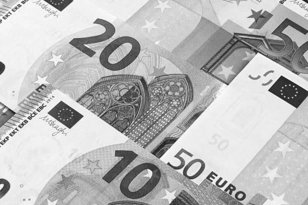 istock Euro money abstract black and white background. 887597548